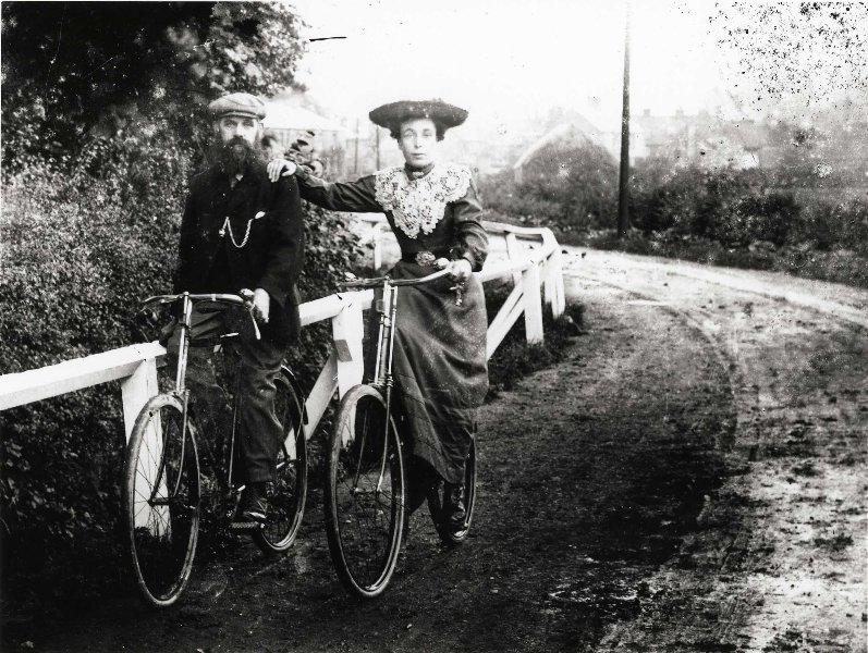 Turn-of-the-century riders coasting, and the coaster-brake hub.